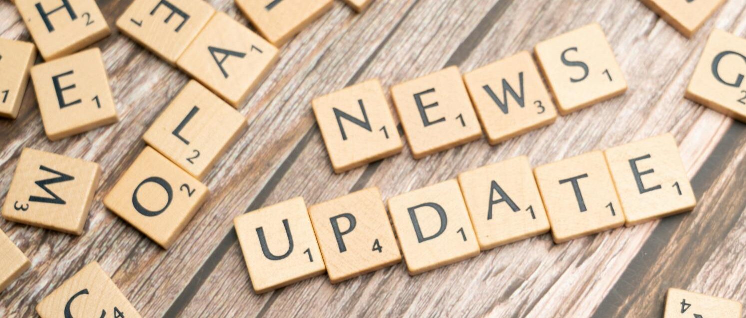 Scrabble tiles spelling 'News Update'